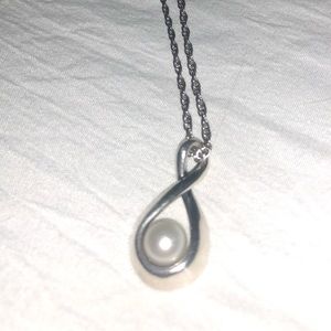 James Avery Pearl charm and 16 inch chain.